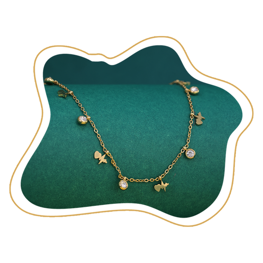 Butterfly & Crystal Charm Necklace – Playful Elegance